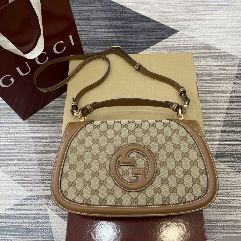 G*u*i top handle bags